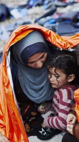 vluchtelingen na een gevaarlijke reis over zee