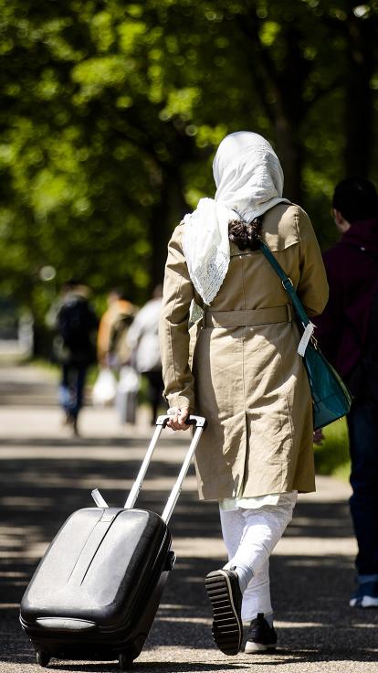 5_vluchtelingmetkoffer