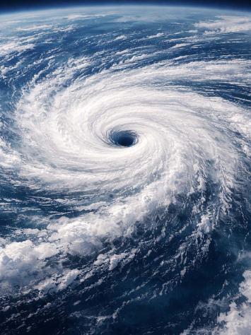 een foto vanuit de ruimte van een orkaan met het oog in het midden