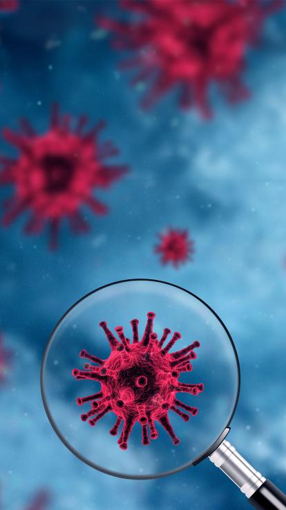 een vergrootglas op een virusdeeltje