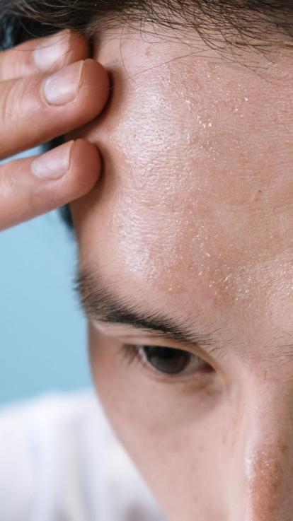 Close up van een bezweet gezicht