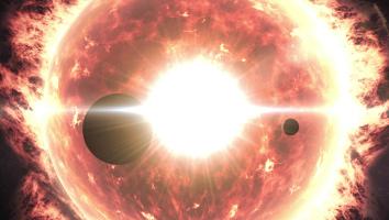 een grote zon met twee kleine zwarte silhouetten van planeten ervoor