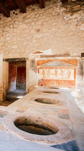 Foto van een toilet in Pompei