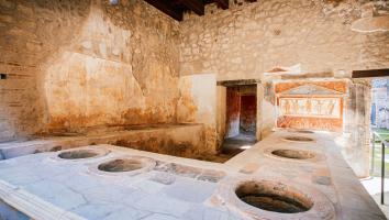 Foto van een toilet in Pompei