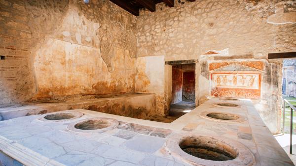 Foto van een toilet in Pompei